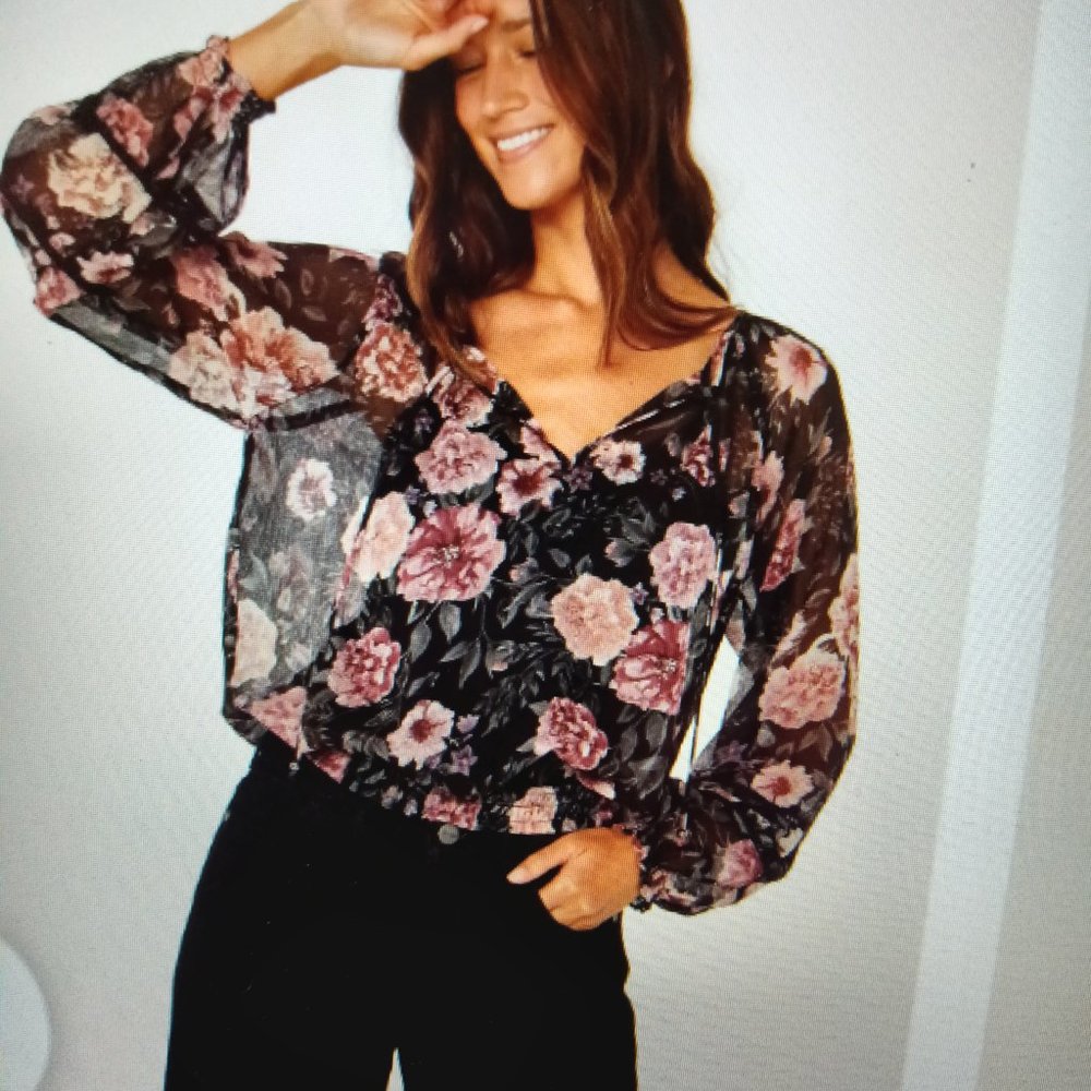 A new sheer black and rose floral blouse by LOVESTITCH.